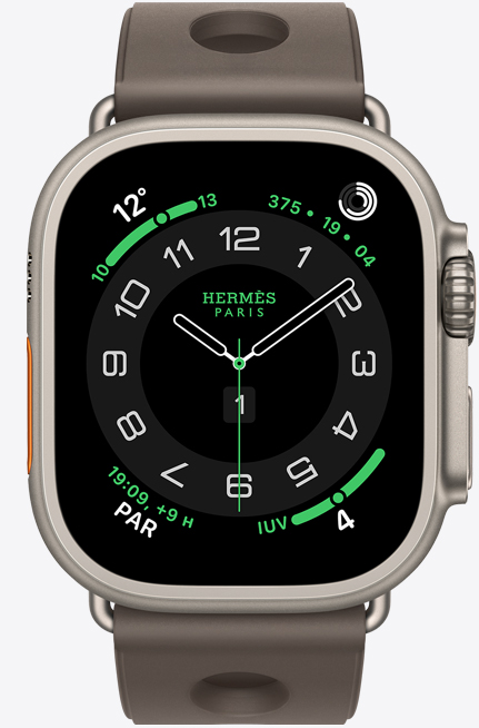 Apple Watch Hermes Ultra 3, bo?tier en titane, naturel, cadran Hermes Circulaire, complications : météo, anneaux d’activité, PAR, indice UV, c?té droit extérieur, Digital Crown, microphone, bouton latéral surélevé, bracelet Scub’H Diving, gris titane