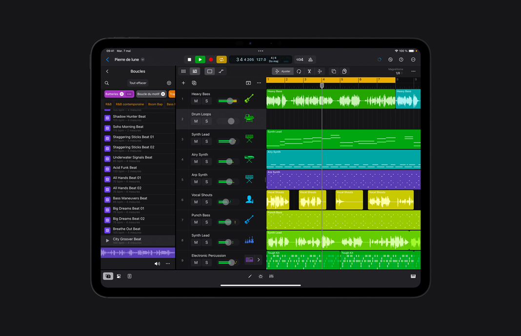 Interface d’une sélection de rythme montrant les sélections visuelles pour Heavy Bass, Drum Loops, Synth Lead, Airy Synth, Vocal Shouts, Punch Bass, Synth Lead et Electronic Percussion.