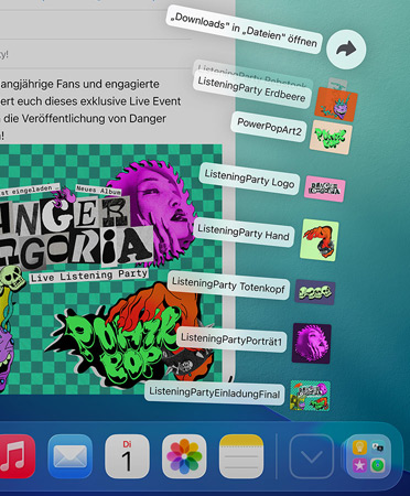 Nahaufnahme des Docks am unteren Bildschirmrand mit einer Reihe von Dateien, die vertikal aus dem Dock herausgef?chert werden