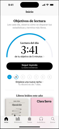 La pantalla de un iPhone muestra la sección Objetivos de Lectura en la app Libros. En la parte superior, hay un anillo de progreso. Debajo del anillo de progreso se muestra la racha de lectura semanal. En la parte inferior se ve la sección Libros Leídos Este A?o, que incluye una fila con dos libros y un espacio vacío para un tercero