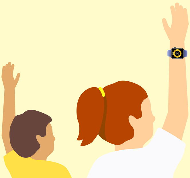 Unos ni?os levantan la mano en un aula con el Apple Watch en la mu?eca.