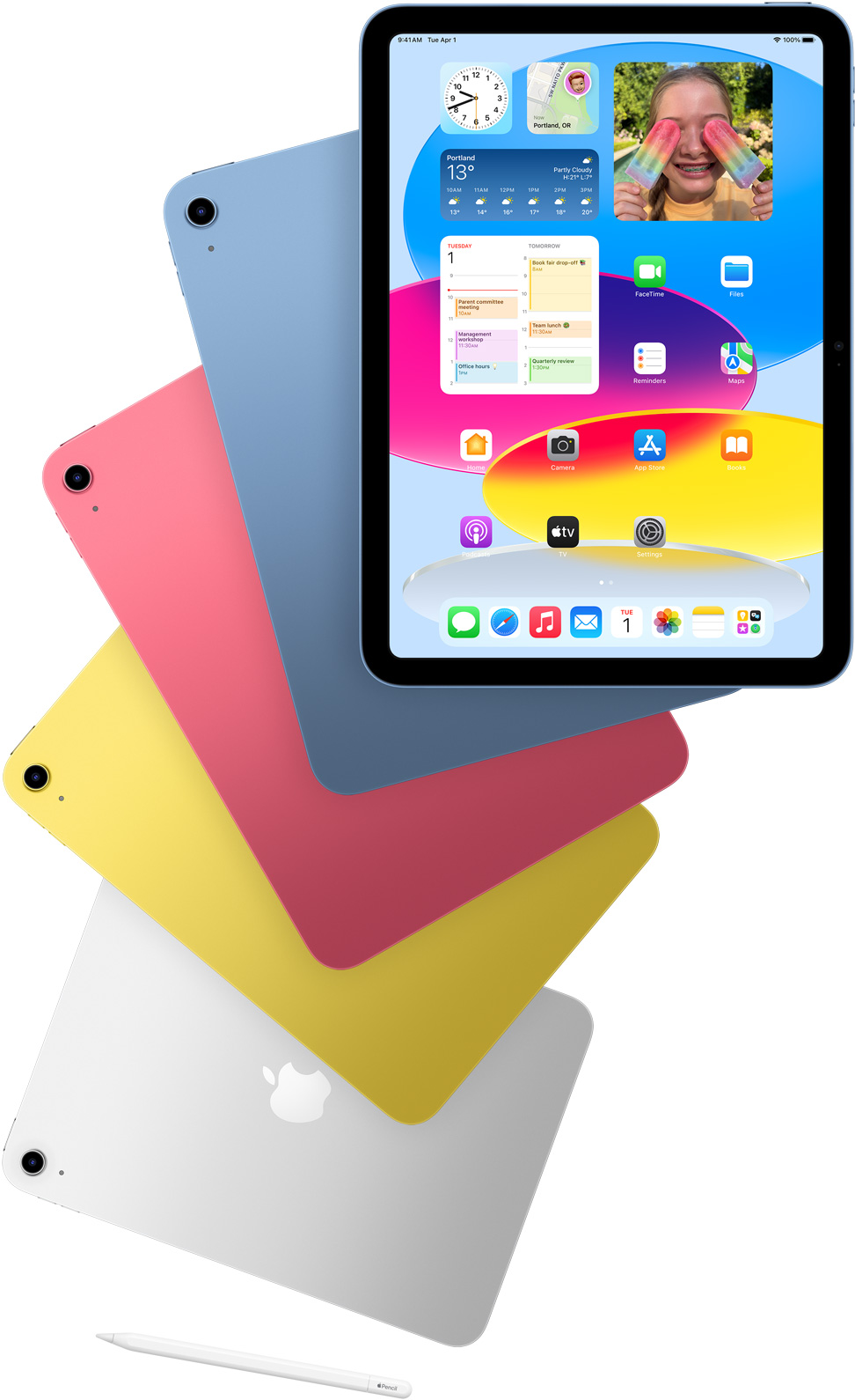 iPad 展示主畫面的正面圖，後方展示藍(lán)色、粉紅色、黃色和銀色 iPad 的機(jī)背。這幾款排列整齊的 iPad 旁邊放著 Apple Pencil。