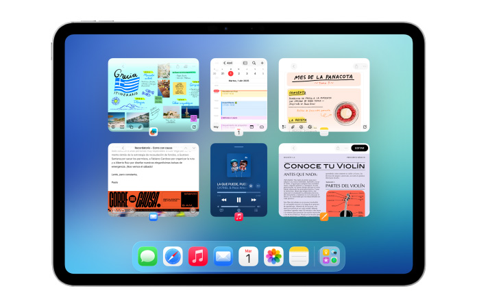 Un iPad, posición horizontal, la pantalla muestra varias apps como Calendario y Música dispuestas en un mosaico de seis ventanas dispuestas en dos filas de igual tama?o