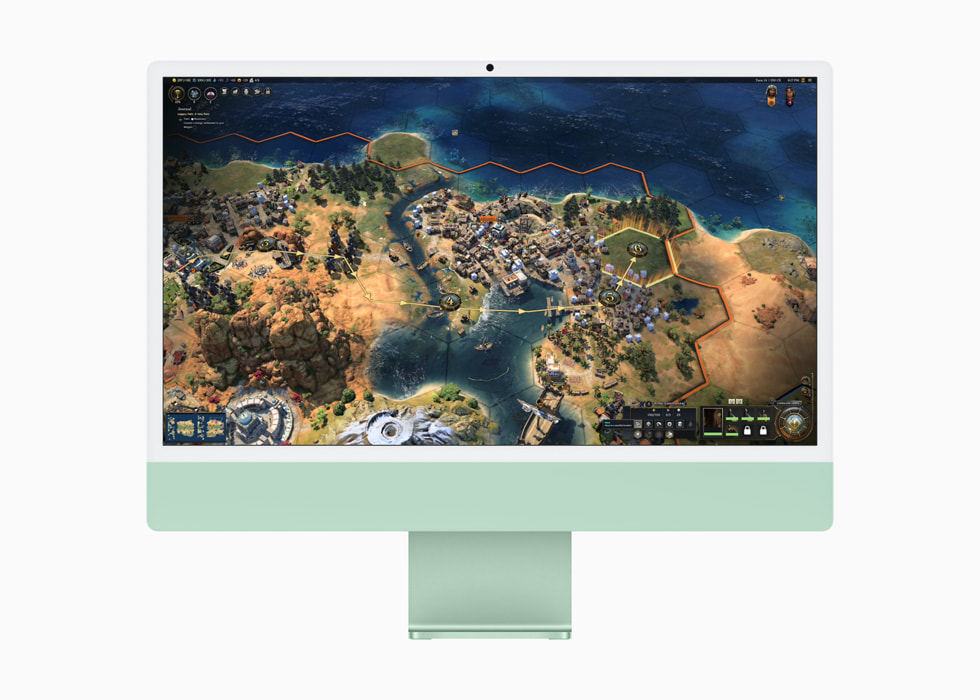 Ye?il bir iMac’te bir kullan?c? Civilization VII oynuyor.
