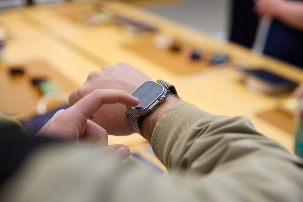 A customer tries on Apple Watch Ultra 3 at Apple Sydney in Sydney, Australia.