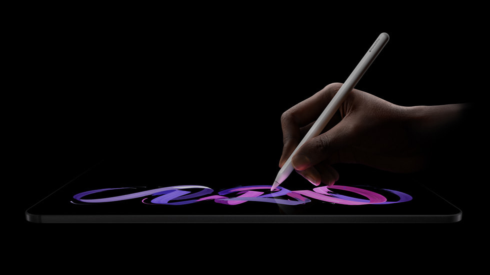 Apple Pencil Pro is shown drawing on the new iPad Pro.