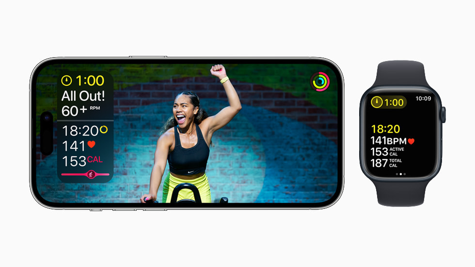 Bài t?p Apple Fitness+ có h??ng d?n trên màn hình v?i watchOS 9 trên Apple Watch Series 8 th?ng qua iPhone 14 Pro.
