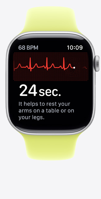 Apple Watch Series 11, aluminium case, silver colour, ECG app, beats per minute in top-left corner, centred rhythm line and timer, Sport Band, neon yellow colour