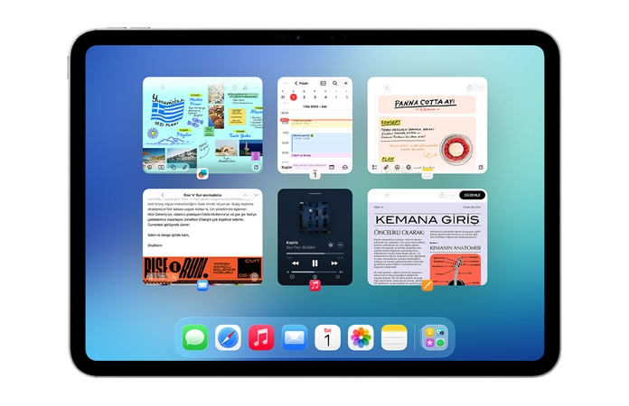 iPad, yatay pozisyonda, ekranda Takvim uygulamas?, Notlar uygulamas?, Apple Music ve Safari dahil olmak üzere iki s?ra halinde a??k alt? pencere g?steriliyor