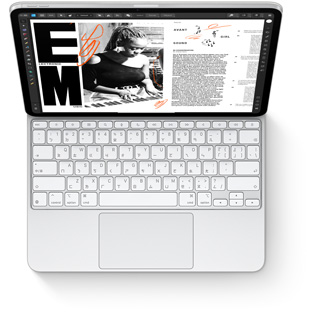 iPad Pro 搭配適用於 iPad Pro 的白色巧控鍵盤的俯視圖。