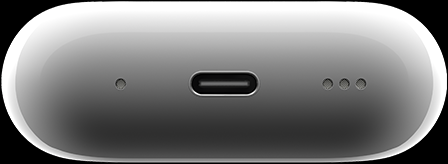 Dessous du bo?tier de charge MagSafe avec les trois trous du haut-parleur intégré.