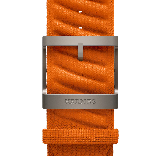 Apple Watch Hermès Ultra 3 En Mer band, orange colour, natural colour hardware, Hermès logo engraved on buckle