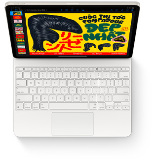 Hình ?nh nhìn t? trên xu?ng c?a iPad Air v?i Magic Keyboard màu tr?ng cho iPad Air.
