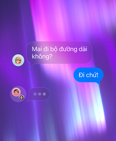 Trò chuy?n nhóm trong Tin Nh?n, ??t trên n?n màu h?ng, tím và xanh d??ng